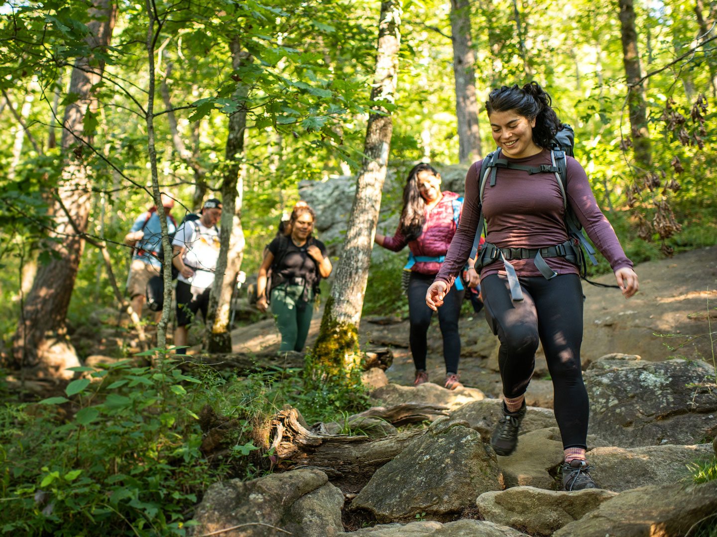 outdoor-activities-group-hiking Group Hiking Wearing Quality Outdoor Clothing